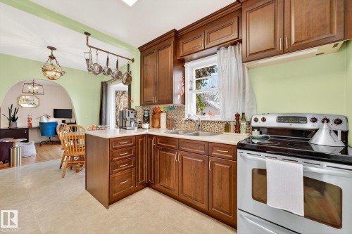 7707 111 Street, Edmonton, AB - Indoor Photo Showing Kitchen With Double Sink