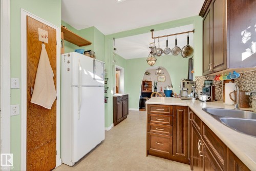 7707 111 Street, Edmonton, AB - Indoor Photo Showing Kitchen With Double Sink