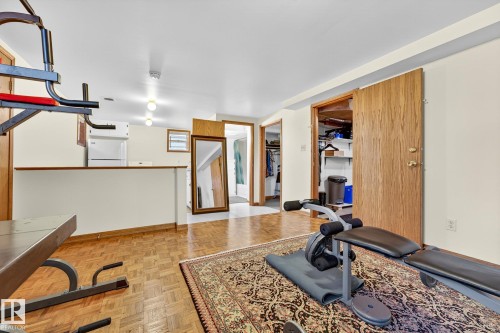 7707 111 Street, Edmonton, AB - Indoor Photo Showing Gym Room