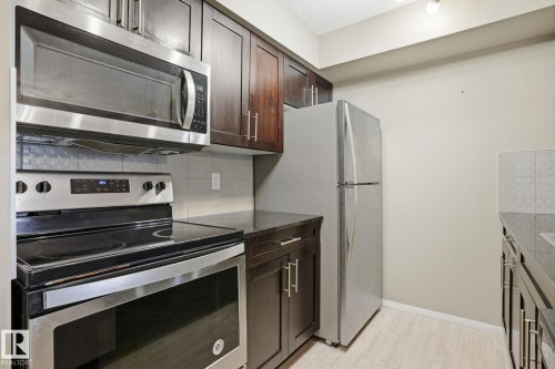 335 3315 James Mowatt Trail, Edmonton, AB - Indoor Photo Showing Kitchen