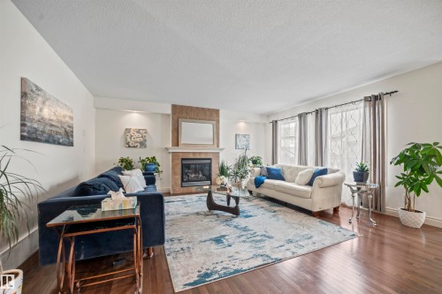 753 173B Street, Edmonton, AB - Indoor Photo Showing Living Room With Fireplace