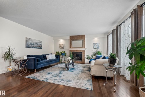 753 173B Street, Edmonton, AB - Indoor Photo Showing Living Room With Fireplace