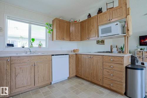 4000 Aspen Way, Leduc, AB - Indoor Photo Showing Kitchen With Double Sink