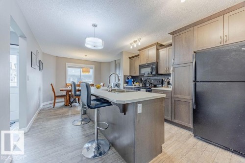 7386 Edgemont Way, Edmonton, AB - Indoor Photo Showing Kitchen With Double Sink