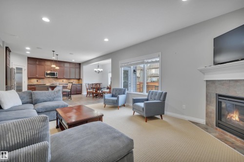 861 Southfork Green, Leduc, AB - Indoor Photo Showing Living Room With Fireplace