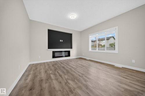 575 Reynalds Wynd S, Leduc, AB - Indoor Photo Showing Living Room
