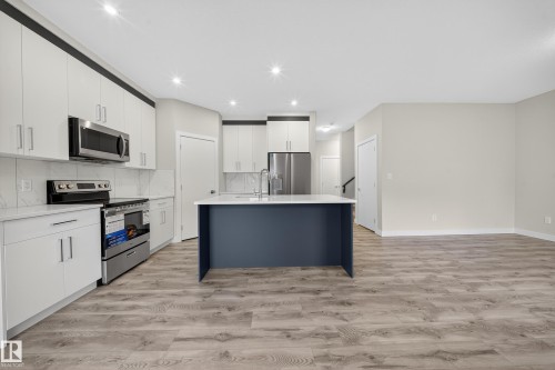 575 Reynalds Wynd S, Leduc, AB - Indoor Photo Showing Kitchen With Stainless Steel Kitchen With Upgraded Kitchen