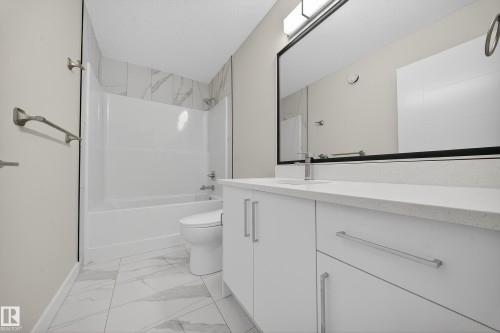 575 Reynalds Wynd S, Leduc, AB - Indoor Photo Showing Bathroom