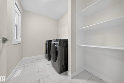 575 Reynalds Wynd S, Leduc, AB - Indoor Photo Showing Laundry Room