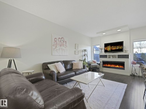 4049 Allan Crescent, Edmonton, AB - Indoor Photo Showing Living Room With Fireplace