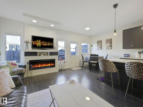 4049 Allan Crescent, Edmonton, AB - Indoor Photo Showing Living Room With Fireplace