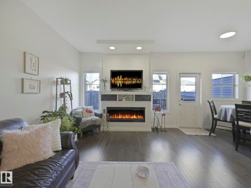 4049 Allan Crescent, Edmonton, AB - Indoor Photo Showing Living Room With Fireplace