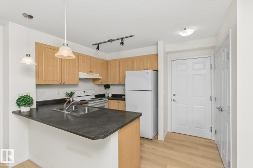 112 630 Mcallister Loop, Edmonton, AB - Indoor Photo Showing Kitchen With Double Sink