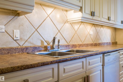 1703 12303 Jasper Avenue, Edmonton, AB - Indoor Photo Showing Kitchen With Double Sink
