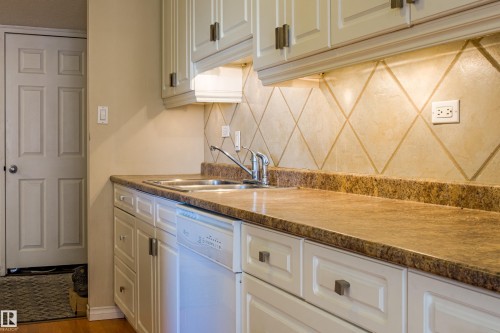 1703 12303 Jasper Avenue, Edmonton, AB - Indoor Photo Showing Kitchen With Double Sink