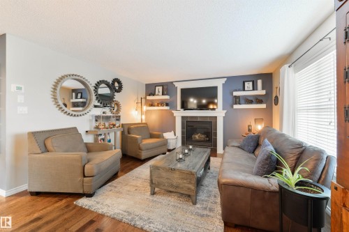 8504 16A Avenue, Edmonton, AB - Indoor Photo Showing Living Room With Fireplace
