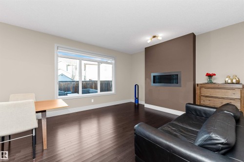 3856 Agar Green, Edmonton, AB - Indoor Photo Showing Living Room With Fireplace