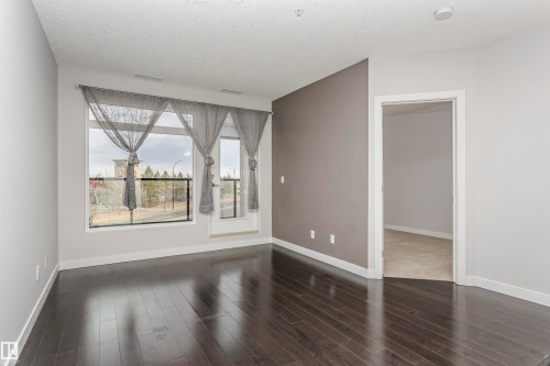 332 5151 Windermere Boulevard, Edmonton, AB - Indoor Photo Showing Other Room