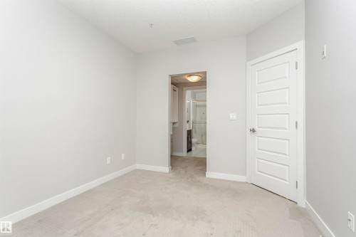 332 5151 Windermere Boulevard, Edmonton, AB - Indoor Photo Showing Other Room