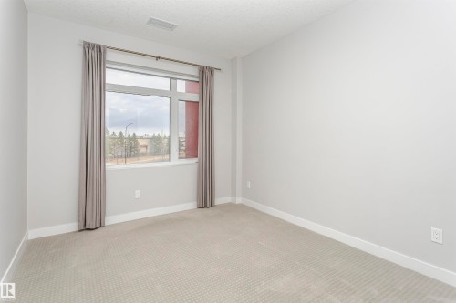 332 5151 Windermere Boulevard, Edmonton, AB - Indoor Photo Showing Other Room