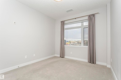 332 5151 Windermere Boulevard, Edmonton, AB - Indoor Photo Showing Other Room