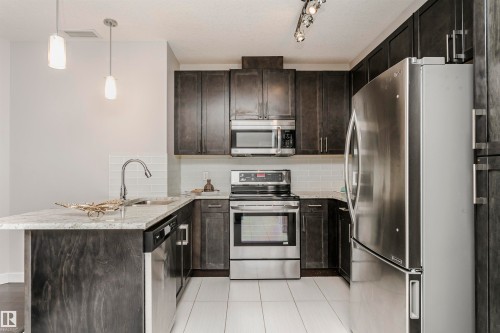 332 5151 Windermere Boulevard, Edmonton, AB - Indoor Photo Showing Kitchen With Upgraded Kitchen