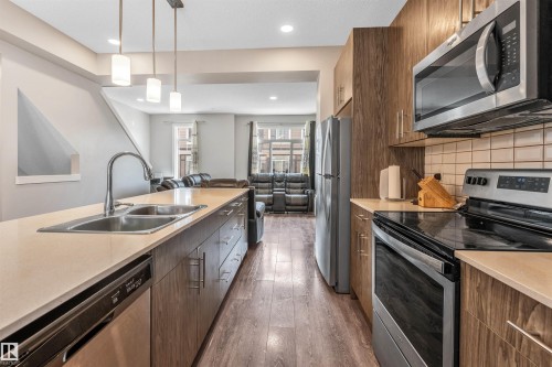 57 2215 24 Street, Edmonton, AB - Indoor Photo Showing Kitchen With Double Sink
