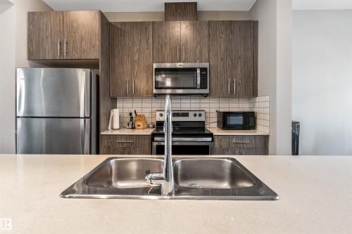 57 2215 24 Street, Edmonton, AB - Indoor Photo Showing Kitchen With Double Sink With Upgraded Kitchen