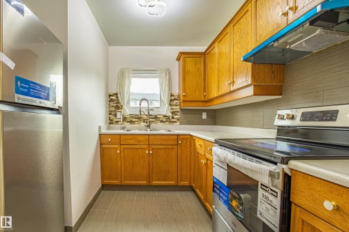 5388 38A Avenue, Edmonton, AB - Indoor Photo Showing Kitchen With Double Sink