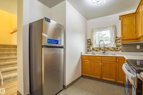 5388 38A Avenue, Edmonton, AB - Indoor Photo Showing Kitchen With Double Sink
