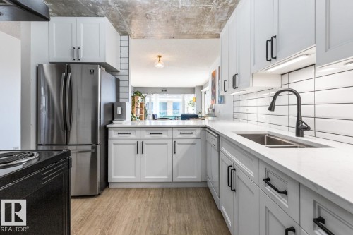 701 10011 123 Street, Edmonton, AB - Indoor Photo Showing Kitchen With Double Sink With Upgraded Kitchen