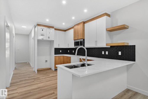 11927 90 Street, Edmonton, AB - Indoor Photo Showing Kitchen With Double Sink