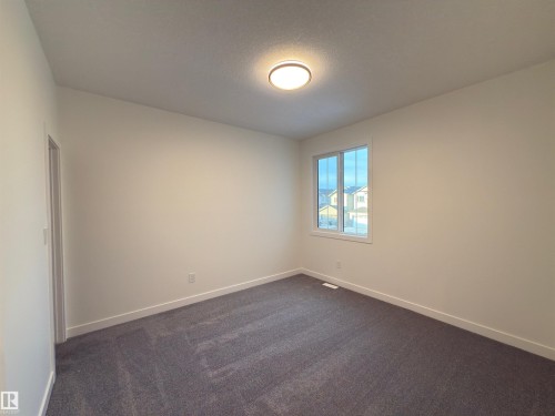 174 Caledon Crescent, Spruce Grove, AB - Indoor Photo Showing Other Room