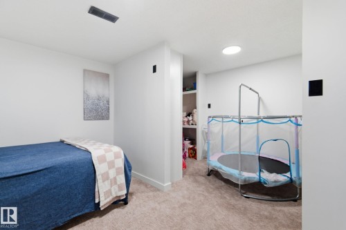 8043 135 Avenue, Edmonton, AB - Indoor Photo Showing Bedroom