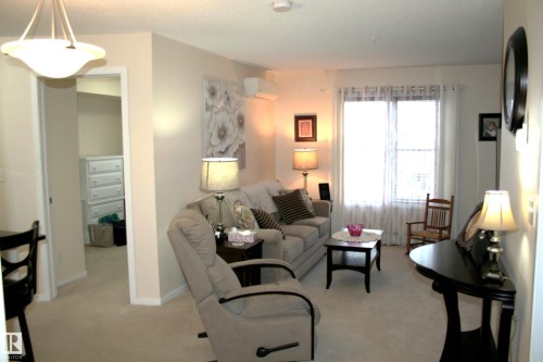 308 107 Watt Common Sw, Edmonton, AB - Indoor Photo Showing Living Room