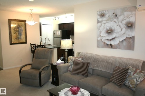 308 107 Watt Common Sw, Edmonton, AB - Indoor Photo Showing Living Room
