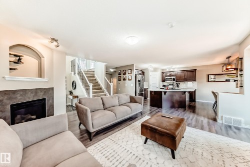2105 32A Street, Edmonton, AB - Indoor Photo Showing Living Room With Fireplace