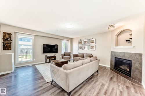 2105 32A Street, Edmonton, AB - Indoor Photo Showing Living Room With Fireplace