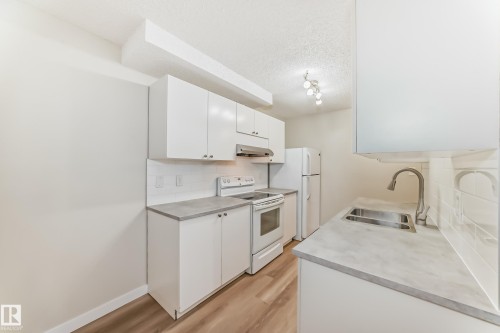 106 6208 180 Street, Edmonton, AB - Indoor Photo Showing Kitchen With Double Sink
