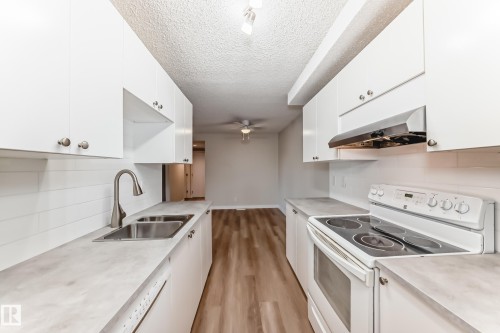 106 6208 180 Street, Edmonton, AB - Indoor Photo Showing Kitchen With Double Sink