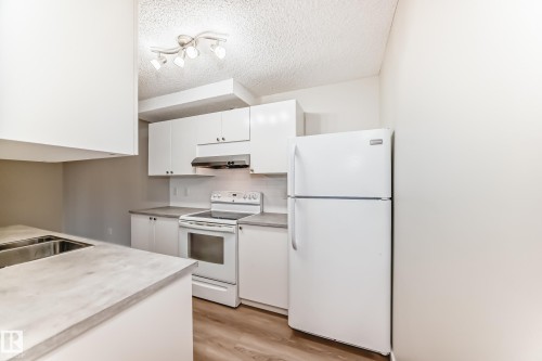106 6208 180 Street, Edmonton, AB - Indoor Photo Showing Kitchen With Double Sink