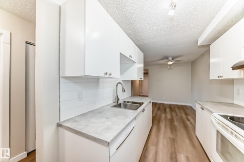 106 6208 180 Street, Edmonton, AB - Indoor Photo Showing Kitchen With Double Sink