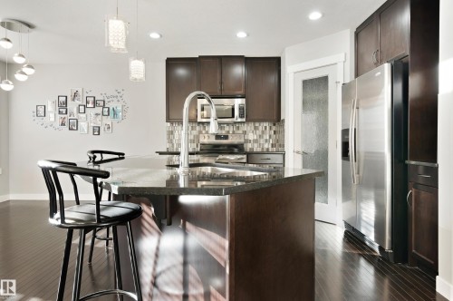 6963 19A Avenue, Edmonton, AB - Indoor Photo Showing Kitchen With Double Sink With Upgraded Kitchen