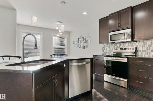 6963 19A Avenue, Edmonton, AB - Indoor Photo Showing Kitchen With Double Sink With Upgraded Kitchen