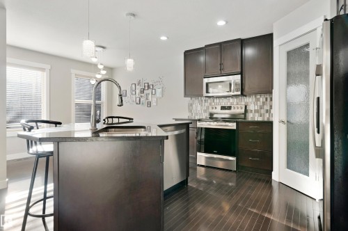 6963 19A Avenue, Edmonton, AB - Indoor Photo Showing Kitchen With Upgraded Kitchen