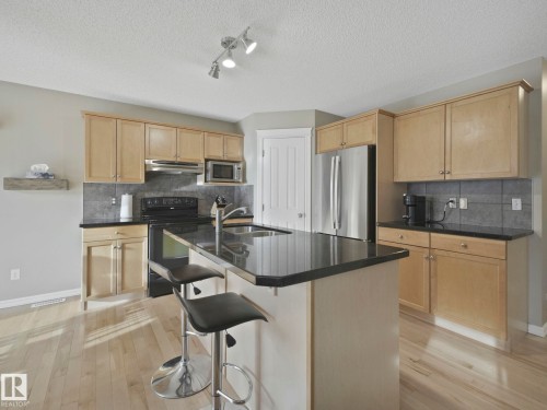 1715 Melrose Crescent, Edmonton, AB - Indoor Photo Showing Kitchen With Double Sink