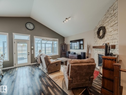 172 Mcdowell Wynd, Leduc, AB - Indoor Photo Showing Living Room With Fireplace