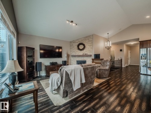 172 Mcdowell Wynd, Leduc, AB - Indoor Photo Showing Living Room With Fireplace