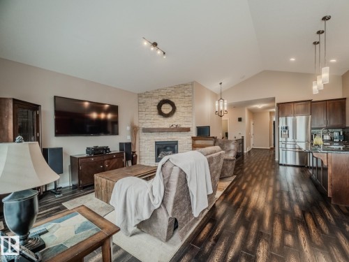 172 Mcdowell Wynd, Leduc, AB - Indoor Photo Showing Living Room With Fireplace
