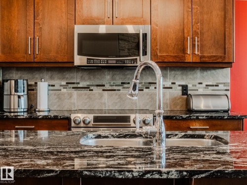 172 Mcdowell Wynd, Leduc, AB - Indoor Photo Showing Kitchen With Double Sink